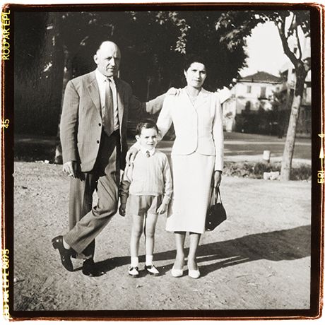 Somewhere with my parents. My family didn't own a camera, had to loan it from a better-doing uncle